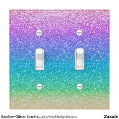 two light switch covers with multicolored glitter