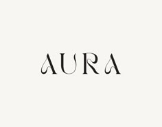 the word aura written in black ink on a white background