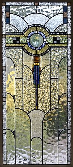 a stained glass window with an abstract design