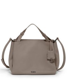 The ultimate day-to-night bag, this chic leather style can be worn two ways: as a crossbody or as a top handle bag. Its minimalist styling and soft unlined structure are the epitome of laid-back luxury. Travel Products, Chic Leather, Saved Items, Leather Style, Handle Bag, Leather Fashion, Tech Accessories, Minimalist Fashion, Top Handle