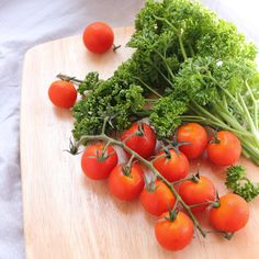 Parsley and tomato on chopping block royalty free stock photo Chopping Block, Parsley, Free Stock Photos