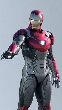 an iron man is standing in the air