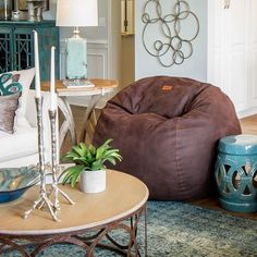 a living room filled with furniture and decor