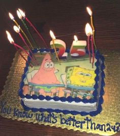 a spongebob birthday cake with candles on it