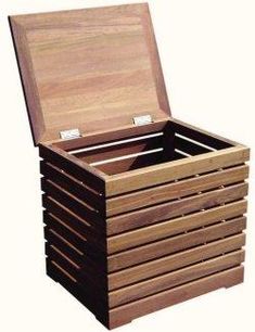 a wooden box with six compartments on the front and one lid open to show its contents