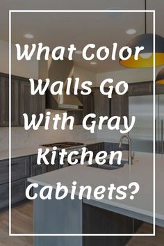 a kitchen with gray cabinets and white counter tops, which says what color walls go with gray kitchen cabinets?