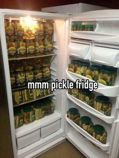 an open refrigerator filled with lots of food