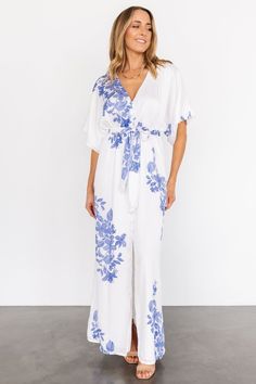 Elevate your summer style with our stunning white and blue floral print kimono maxi dress. Featuring a flattering V neckline and short flutter sleeves, this dress is the perfect blend of elegance and comfort for any special occasion. Kimono Wedding Dress, Kimono Maxi Dress, White Kimono, Maxi Dress White, Floral Print Kimono, Baltic Born, Short Kimono, Blue Embroidery, Print Kimonos