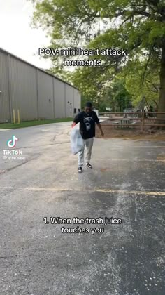 a man walking across a parking lot with a bag in his hand and the words pov maintain attack moments