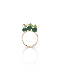 Peppy Design's playful Green Gummy Ring is made from irregularly-shaped peridot and green aventurine that overlap to create an asymmetrical and candy-like effect. This is a great ring to stack and mix and match, or even loop on a hoop earring. This product is not eligible for promotional discount. Transitional Dressing, Aventurine Stone, Heeled Mules Sandals, Bridal Event, Book Candle, Fine Jewelry Designers, Green Aventurine, Event Dresses, Green Gold