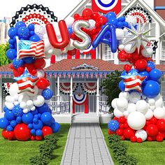 two red, white and blue balloons are in front of a house with the word usa on it