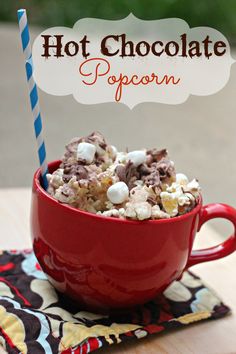 hot chocolate popcorn with marshmallows in a red bowl