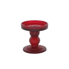 a red candle holder on a white background