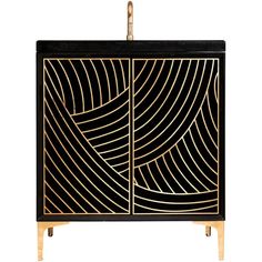 a black and gold cabinet with an intricate design on the front, two doors open