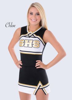 a cheerleader is posing for the camera with her hands on her hips and one hand on her hip