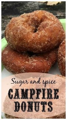 sugar and spice campfire donuts on a plate with the words, sugar and spice campfire donuts