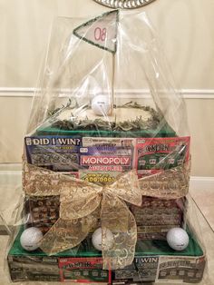 a golf themed gift basket with balls and tees