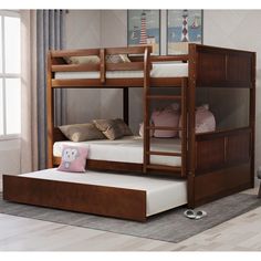 a bunk bed with two sets of mattresses on the bottom and lower bunk beds