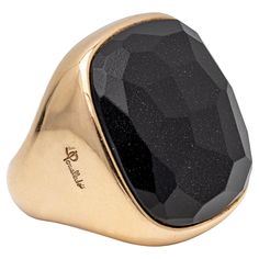 An exuberant fashion ring signed by Pomellato, featuring a fabulous and authentic Victoria black jet amulet stone, bezel-set in 18K rose gold. Size 5.5 US, resizable upon request. Luxury Oval Cabochon Gemstone Signet Ring, Pomellato Jewelry Gold Rings, Luxury Polished Oval Cabochon Ruby Ring, Luxury Black Oval Cabochon Jewelry, Luxury Black Amulet Necklace, Bezel Setting, 18k Rose Gold, Fashion Rings, Or Rose