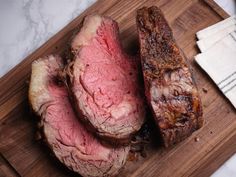 some meat is sitting on a cutting board