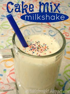 cake mix milkshake with sprinkles in a glass mug