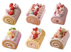 there are many different types of food on the roll cake slices and strawberries, raspberries, strawberry shortcakes, rolled up with icing