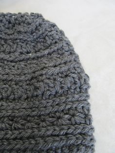 "This adult gray beanie in pattern \"Bulky Brighton Beanie\" by Silver Maple Stitches is made with soft 100% acrylic bulky yarn for extra warmth.  Machine wash cold.  Machine dry low or dry flat. Adult small.  21 inch brim will comfortably stretch to fit 22 inch head.  8 inches from crown to bottom of brim.  Add a faux fur pompom for an additional $3.00.  Pompom snaps off for easy hat washing.  To be sure the hat will fit you properly, wrap a tape measure around your forehead, above your ears an Gray Beanie, Grey Beanie, Bulky Yarn, Tape Measure, Ruler, Caps Hats, Accessories Hats, Faux Fur, Winter Hats