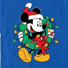 a mickey mouse christmas tree on a blue background