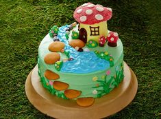 there is a cake that looks like it has a mushroom on top and water in the middle