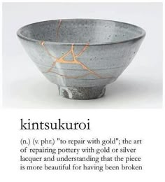 a bowl with some writing on it and an image of the words kintsuuru