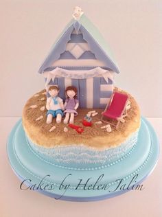 there is a cake that looks like a beach hut