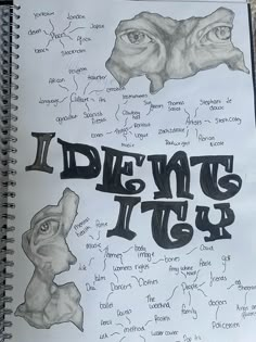 an open notebook with drawings on it and words written in black ink that spell out the word identus