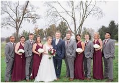 a bride and groom with their bridal party