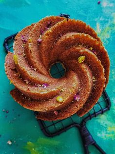 a bundt cake sitting on top of a cooling rack