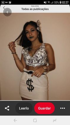 a woman wearing a skirt and top with dollar signs on it