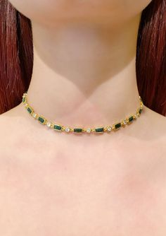 Stunning emerald choker necklace featuring lab simulated emerald stones and fine cz. 18k yellow gold plated. Imported. Luxury Green Rectangular Necklace, Emerald Choker Necklace, Emerald Choker, Bal Gopal, Ladies Necklace, Green Dot, Emerald Necklace, Gold Choker, Emerald Stone