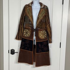 Guc. Boho Style Jacket. 50% Polyester, 40% Cotton, 5% Rayon, 5% Nylon. Approximate Flat Lay Measurements: Shoulder Width- 16” Chest-17 1/2” Sleeve Length- 23 1/2” Front Length- 40” Designer Long Coat For Fall, Fitted Patchwork Outerwear, Designer Fitted Brown Outerwear, Designer Fitted Outerwear For Fall, Designer Fitted Long Coat, Elegant Patchwork Outerwear For Fall, Elegant Patchwork Outerwear For Spring, Fitted Patchwork Long Coat, Fitted Long Patchwork Coat