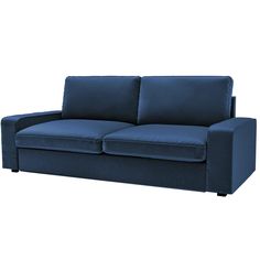 a blue couch sitting on top of a white floor