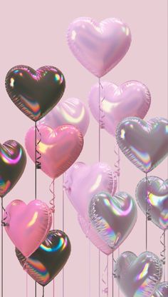 there are many heart shaped balloons in the air