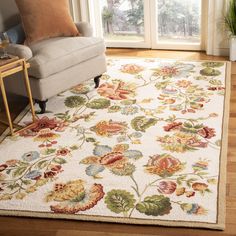 Featuring a marvelous selection of American Country, floral blooms, and turn-of-the-century European designs, the Chelsea Rug Collection adds a warm, welcoming aspect to room decor. Chelsea is made using 100% pure virgin wool, hand-hooked to a durable cotton backing. This collection is handmade exclusively for SAFAVIEH. Safavieh Chelsea Lore 3 X 4 (ft) Wool Ivory Indoor Floral/Botanical Throw Rug in White | HK331A-24 Hand Hooked Wool Rug, Hooked Wool, Floral Area Rugs, Round Area Rugs, Wool Runner Rug, Wool Runners, European Designs, Ivory Rug, Contemporary Rugs