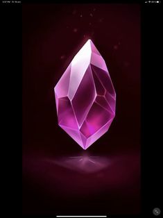 a pink diamond on a dark background with the light reflecting off it's side