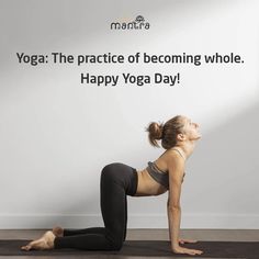 a woman is doing yoga in front of a sign that says, yoga the practice of becoming whole happy yoga day