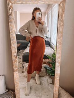 Orange Satin Midi Skirt Outfit, Satin Skirt Oversized Sweater, Fall Orange Skirt Outfits, Satin Midi Slip Skirt Outfits, How To Wear Satin Midi Skirt, Christmas Work Party Outfits 2024, How To Style A Satin Maxi Skirt, Womens Silk Skirt Outfit, Gold Slip Skirt