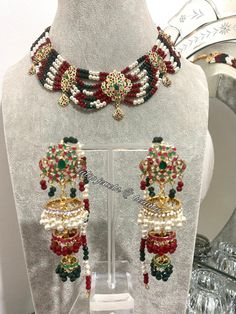 the necklace and earrings are on display