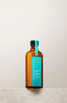 Moroccan Oil Original Treatment 3.4 OZ for all hair types. A multitasking, argan oil-infused hair oil to smooth frizz, detangle, condition, and boost shine by up to 118%. Named the #1 haircare oil in the US.* DETAILS Get the silky, shiny and healthy hair you've always wanted. Moroccanoil Treatment is the product that pioneered oil-infused hair care and created the worldwide buzz on argan oil. The original foundation for hairstyling, Moroccanoil Treatment can be used as a conditioning, styling an Salon Services, Hair Shine, Moroccan Oil, Smooth Hair, All Hair Types, Blow Dry, Argan Oil, Dry Hair, Hair Oil