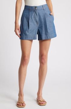 Soft pleats elevate the style of relaxed-fit, trouser-inspired shorts made from lightweight denim. Zip fly with button closure Front slant pockets 100% cotton Machine wash, line dry Imported Spring Jean Shorts With Pockets, Chic Relaxed Fit Medium Wash Bottoms, High-waist Denim Bermuda Shorts For Summer, High Waist Denim Bermuda Shorts For Summer, Chic Relaxed Fit Denim Bottoms, Chic Denim Bottoms With Relaxed Fit, Mid-rise Bermuda Shorts In Medium Wash For Summer, Medium Wash Mid-rise Bermuda Shorts For Summer, Mid-rise Medium Wash Bermuda Shorts For Summer