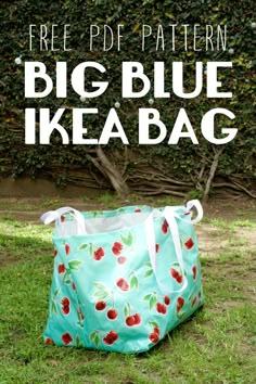 a large blue bag sitting on top of a grass covered field with the words free pattern big blue ikea bag