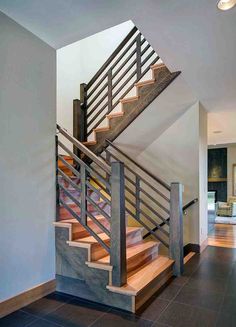 there is a wooden stair case in the house