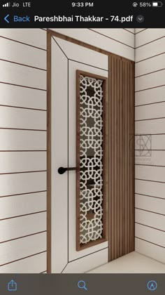 an open door on the side of a house with decorative screens and wood paneling