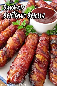 bacon wrapped hot dogs on a plate with ketchup